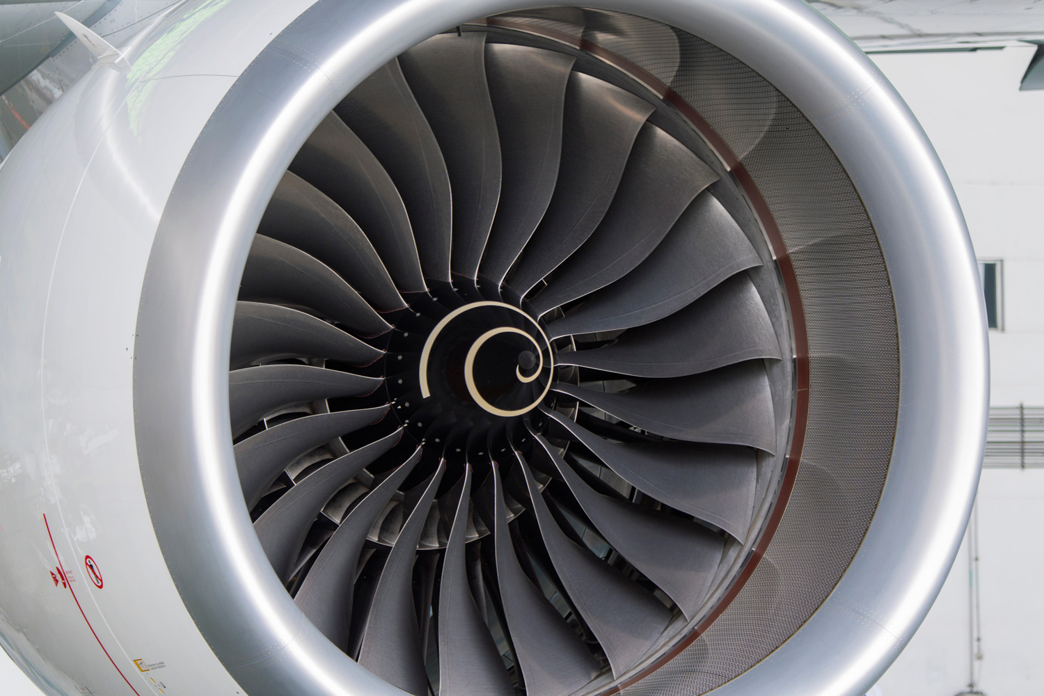 Close-up of a jet engine turbine with blades, representing aerospace engineering and precision manufacturing, highlighting the importance of due diligence and technical expertise in consulting.