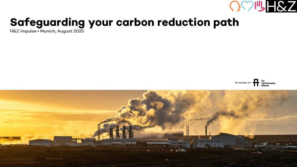 Industrial plant emitting steam and smoke at sunrise with text “Safeguarding your carbon reduction path”, illustrating supply chain decarbonisation and carbon reduction strategies in consulting.